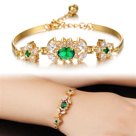 Women's designer gold bracelets with gemstone .